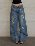 Jeans Blu Strappi